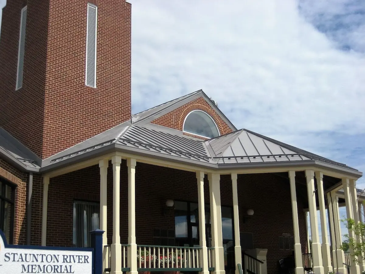 Skilled roofing craftsmen working on a residential roof in Waterford
